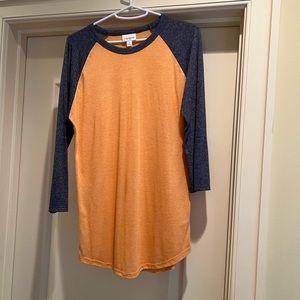 Orange and blue baseball top